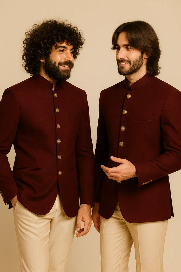 Two men in coordinated wine Bandhgala Jodhpuri suits and beige trousers for a Suva, Fiji wedding