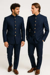 Two men in navy blue Bandhgala Jodhpuri suits with matching trousers for a Nairobi wedding guest look