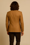 Back view of camel brown Bandhgala coat with dark brown trousers for a Birmingham reception