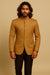 Front view of camel brown Jodhpuri suit with dark brown trousers for an Indian wedding in New York