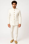Front view of white imported polyester Jodhpuri suit with waist flap pockets for a Bengaluru groom look