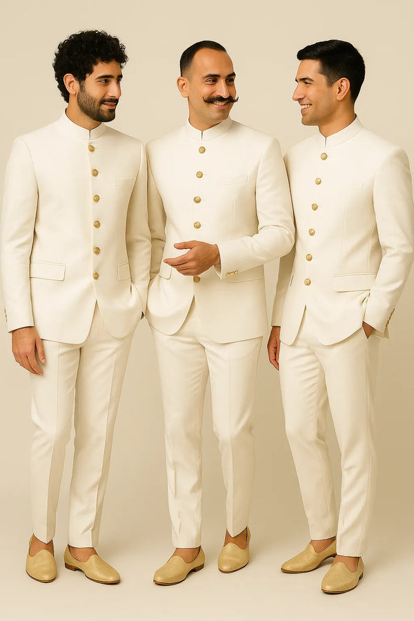 Three men wearing matching white Bandhgala Jodhpuri suits for a Dehradun wedding celebration