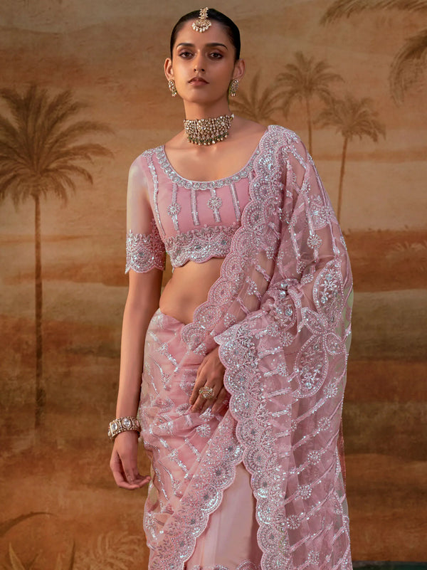 Blush Pink Premium Net Designer Saree featuring a matching heavy embroidered blouse for luxury wedding wear | BharatPlaza