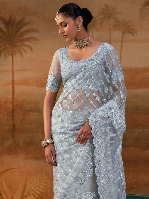 Silver Grey Premium Net Designer Saree featuring a matching heavy embroidered blouse for luxury wedding wear | BharatPlaza