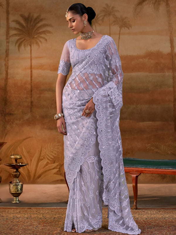 Lavender Premium Net Designer Saree showcasing exquisite zarkan and zircon stone work for wedding wear | BharatPlaza