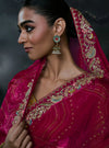 Rani Pink Tissue Silk Organza Designer Saree featuring an elegant drape over the head for luxury wedding wear | BharatPlaza