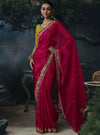 Rani Pink Tissue Silk Organza Designer Saree displaying an intricate sequence and stone work fancy border | Shop BharatPlaza