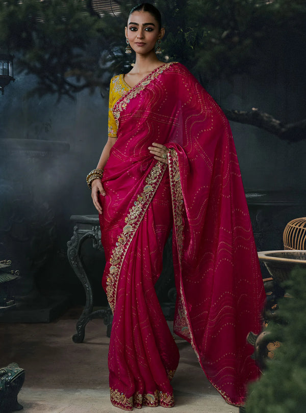 Rani Pink Tissue Silk Organza Designer Saree displaying an intricate sequence and stone work fancy border | Shop BharatPlaza
