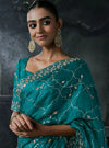 Teal Green Tissue Silk Organza Designer Saree displaying a beautiful matching embroidered blouse for brides | BharatPlaza