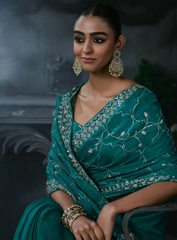 Teal Green Tissue Silk Organza Designer Saree showcasing a stunning heavy fancy border for festive wear | BharatPlaza