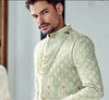 Elegant mint green Sherwani with cutdana & beads work closeup