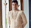 Elegant peach Sherwani with Lakhnavi fabric and beads work closeup