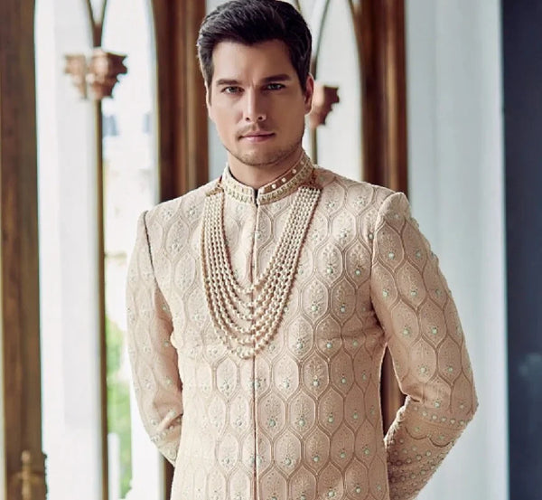 Elegant peach Sherwani with Lakhnavi fabric and beads work closeup
