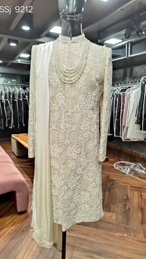 Elegant royal beige sherwani for NRI wedding celebrations worldwide | BharatPlaza