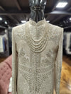 Royal Resham embroidered with zari and bead work on a men's sherwani for Indian Groom in California