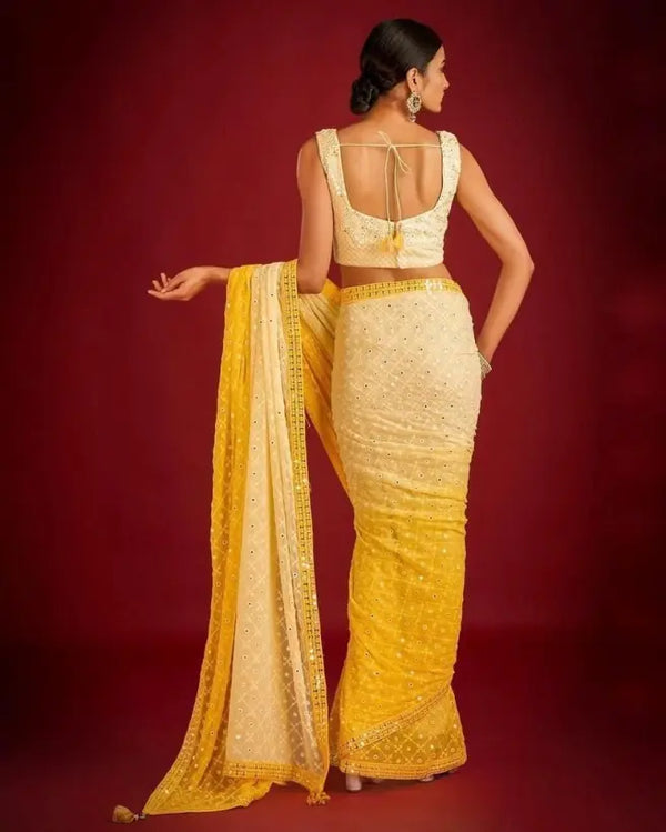 Yellow–white shaded georgette saree with embroidered blouse