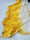 Georgette yellow–white ombre shaded saree showcasing intricate embroidery & sequin border