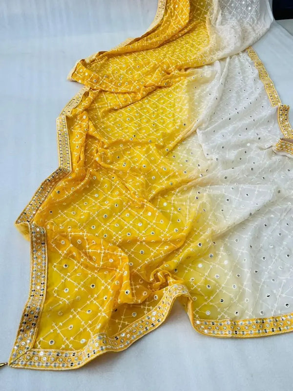 Georgette yellow–white ombre shaded saree showcasing intricate embroidery & sequin border