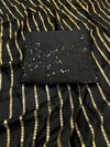 Elegant black sequins saree draped look