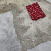 Elegant scallop border design on off white organza saree