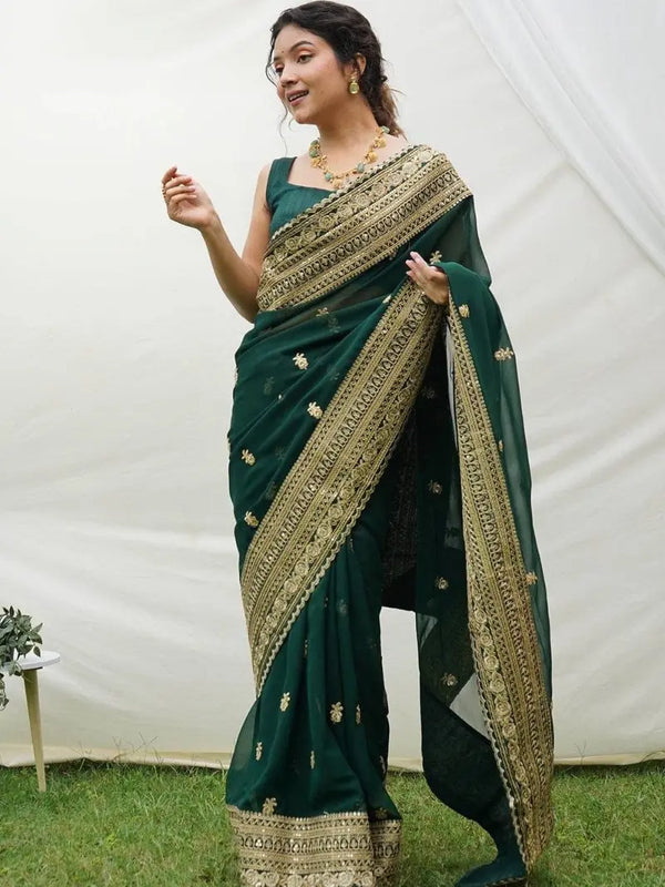 Emerald green georgette saree with butta embroidery & zari lace border