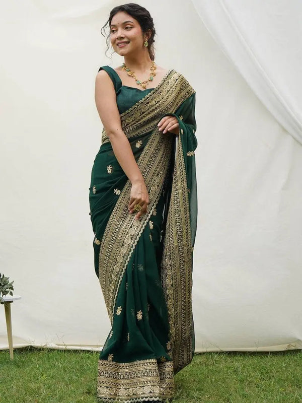 Elegant emerald green saree with golden embroidery & raw silk blouse