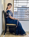 Navy Blue chiffon saree with embroidery border front pose