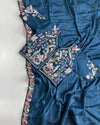 Navy Blue saree flatlay with embroidered blouse close-up
