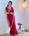 Rani Pink chiffon saree with designer blouse, standing pose