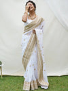Model wearing white faux georgette saree with zari lace border
