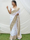 Elegant white saree with golden embroidery and raw silk blouse