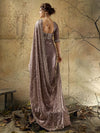 Full view of dusty mauve velvet satin saree with ornate border for a luxury wedding celebration in Dubai