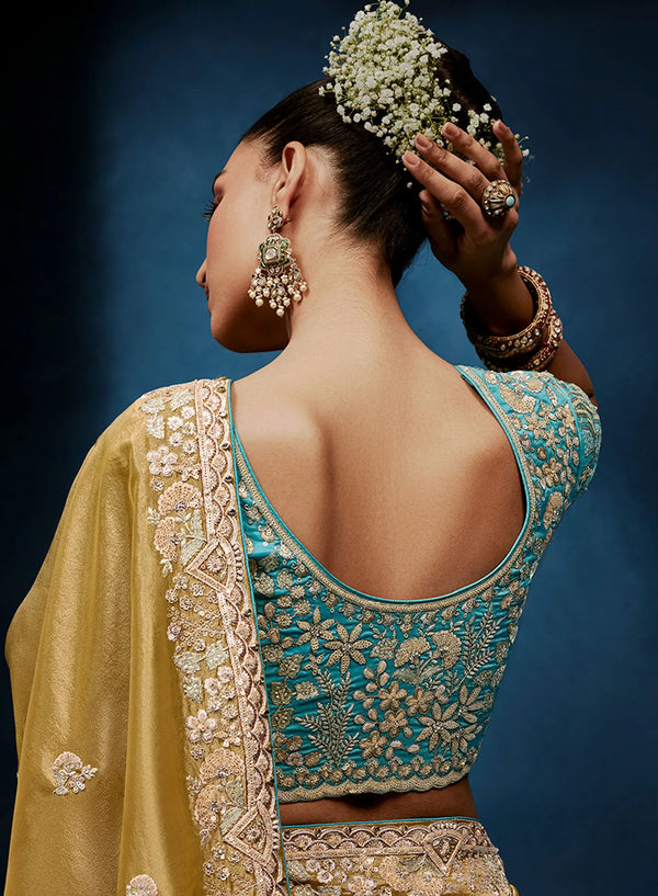 Gold Fancy Fabric Designer Saree displaying stunning back blouse embroidery for luxury bridesmaid wear | BharatPlaza
