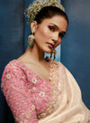 Ivory Fancy Fabric Designer Saree featuring a contrasting heavy pink stitched blouse for festive wear | BharatPlaza