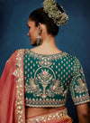Peach Fancy Fabric Designer Saree featuring a contrasting heavy green stitched blouse for festive wear | BharatPlaza