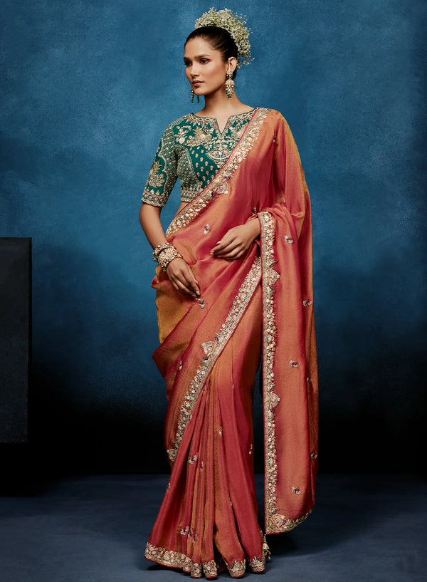 Peach Fancy Fabric Designer Saree showcasing an elegant peacock motif blouse for luxury wedding wear | BharatPlaza