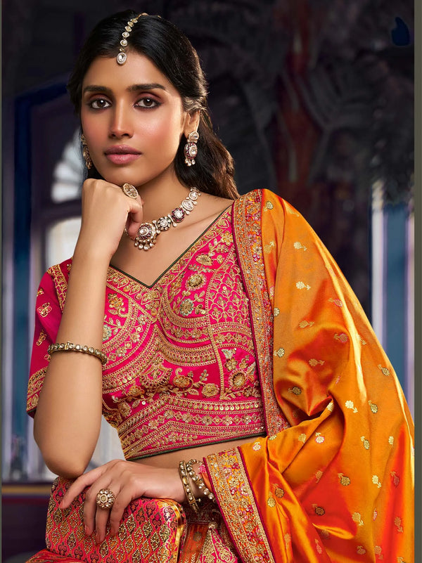 Pink and mustard bridal lehenga blouse with woven dupatta for an elegant Indian wedding in London