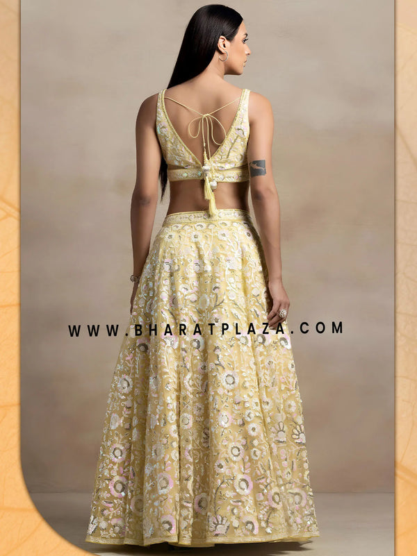 Yellow sequins lehenga backless choli design for sisters and destination weddings Dubai